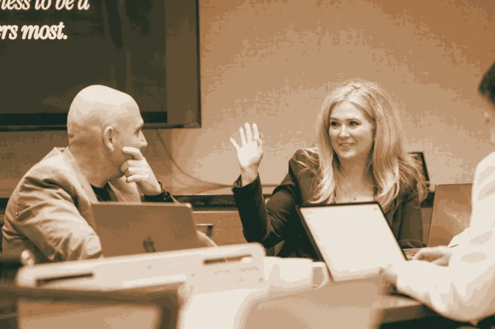 An executive asking a question during the session