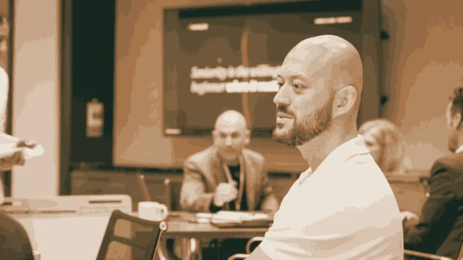 An executive listening during the session