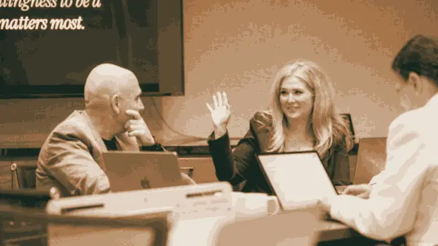 An executive asking a question during the session